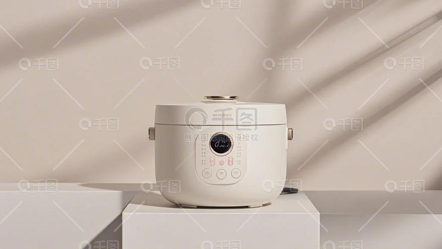 电饭煲浅灰色展台厨房家电产品高清摄影图